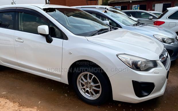 Subaru Impreza 2.0i Limited PZEV 4dr Hatchback AWD (2.0L 4cyl CVT) 2014
