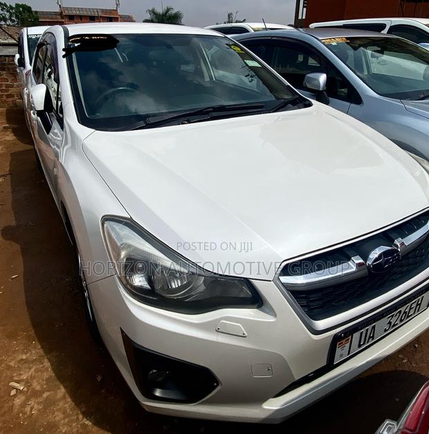 Subaru Impreza 2.0i Limited PZEV 4dr Hatchback AWD (2.0L 4cyl CVT) 2014