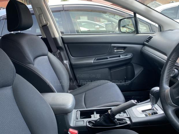 Subaru Impreza 2.0i Limited PZEV 4dr Hatchback AWD (2.0L 4cyl CVT) 2014