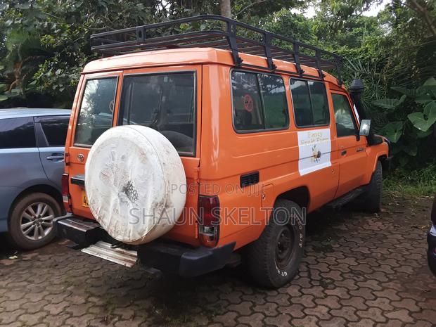 Toyota Land Cruiser 100 4.2 2008 Orange