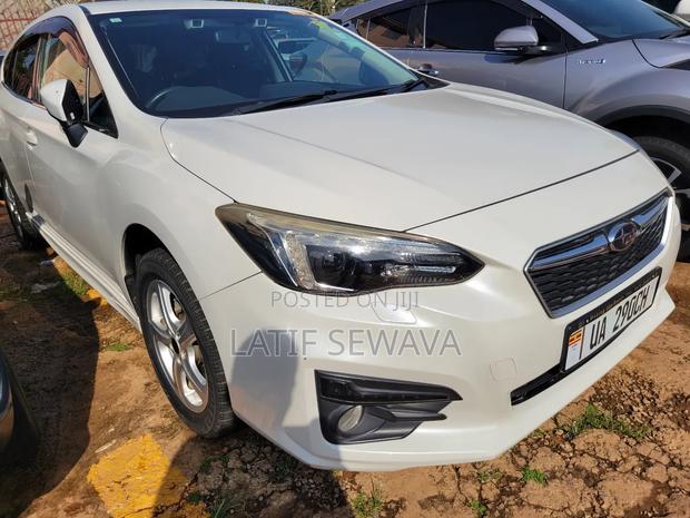 Subaru Impreza 2.0i Limited PZEV 4dr Hatchback AWD (2.0L 4cyl CVT) 2015