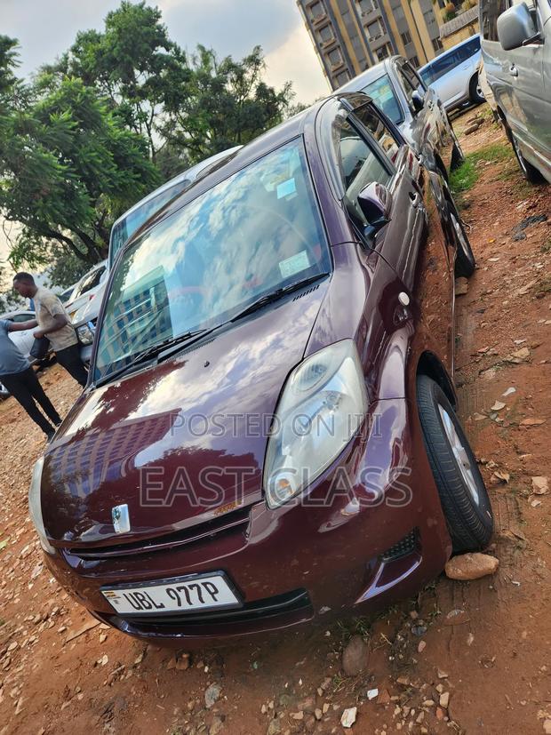 Toyota Passo 1.0 FWD 2009 Maroon