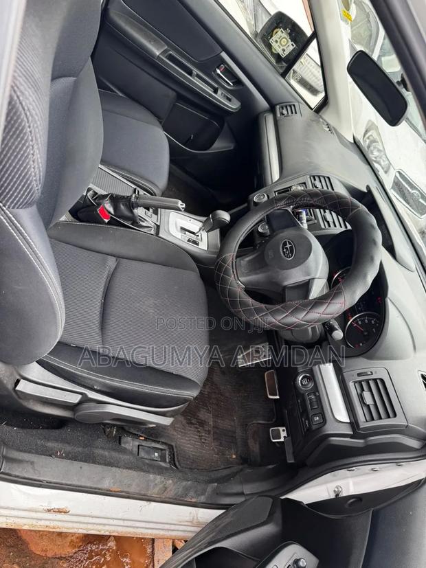 Subaru Impreza 2.0i Limited PZEV 4dr Hatchback AWD (2.0L 4cyl CVT) 2014