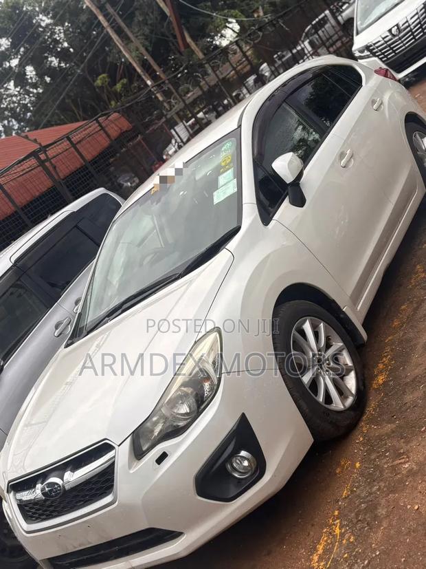 Subaru Impreza 2.0i Limited PZEV 4dr Hatchback AWD (2.0L 4cyl CVT) 2014