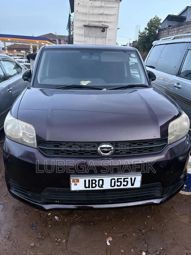 Toyota Corolla Rumion 2010 Maroon