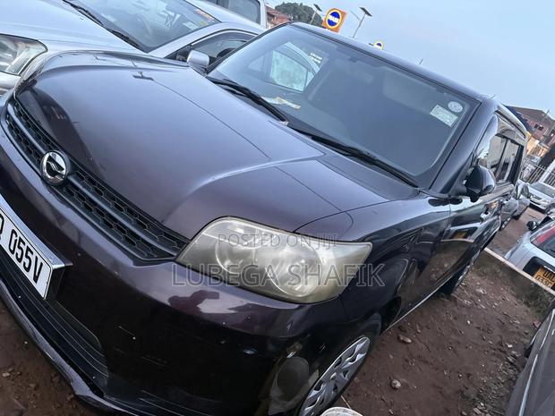 Toyota Corolla Rumion 2010 Maroon