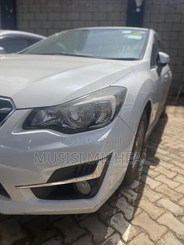 Subaru Impreza 2.0i Sport Premium PZEV 4dr Hatchback AWD (2.0L 4cyl 5M)
