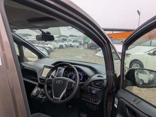 Toyota Noah 1.8 FWD Hybrid (7 seater) 2014 Burgundy