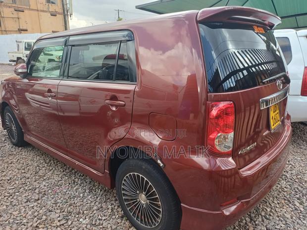 Toyota Corolla Rumion 2009 Maroon