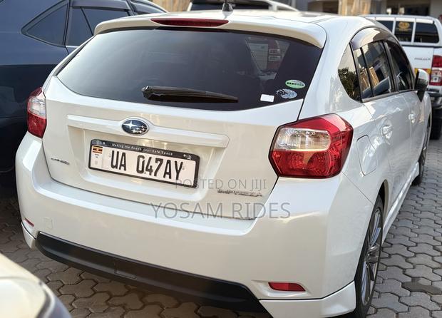 Subaru Impreza 2.0i Limited PZEV 4dr Hatchback AWD (2.0L 4cyl CVT) 2014