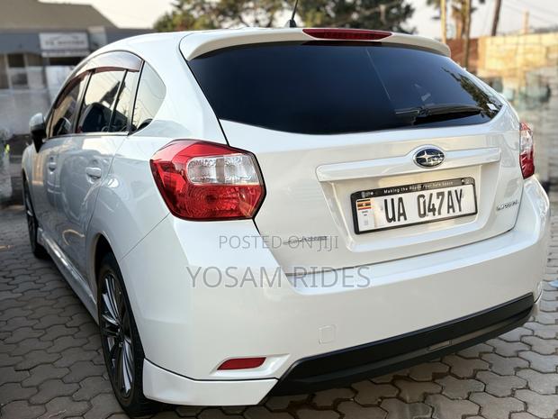 Subaru Impreza 2.0i Limited PZEV 4dr Hatchback AWD (2.0L 4cyl CVT) 2014