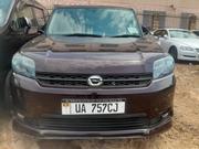 Toyota Corolla Rumion 2012 Maroon for sale