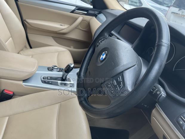 BMW X3 xDrive28i 4dr SUV AWD (2.0L 4cyl Turbo 8A) 2014 Gold