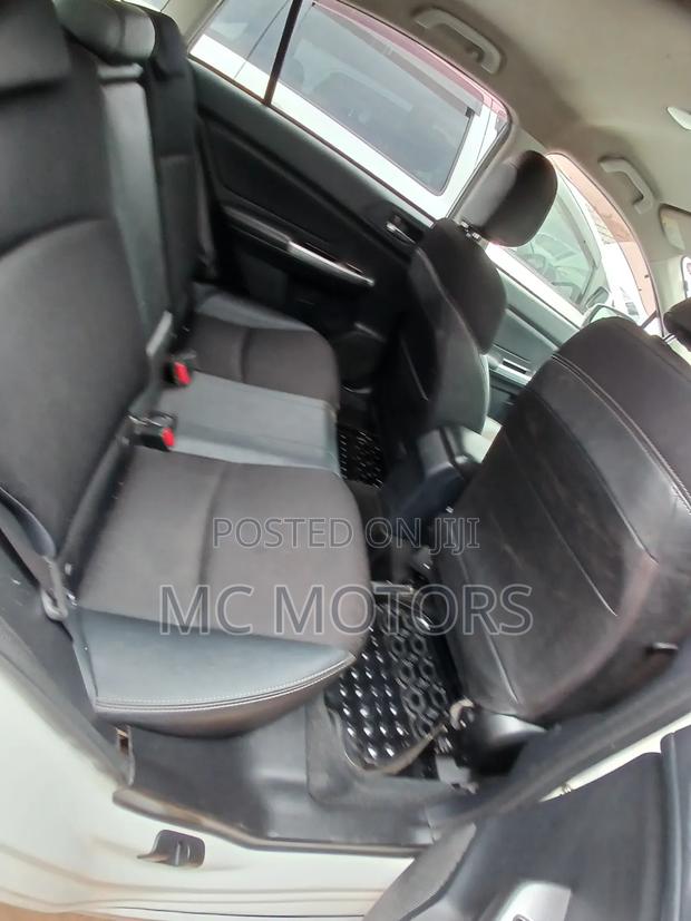 Subaru Impreza 2.0i Limited PZEV 4dr Hatchback AWD (2.0L 4cyl CVT) 2015