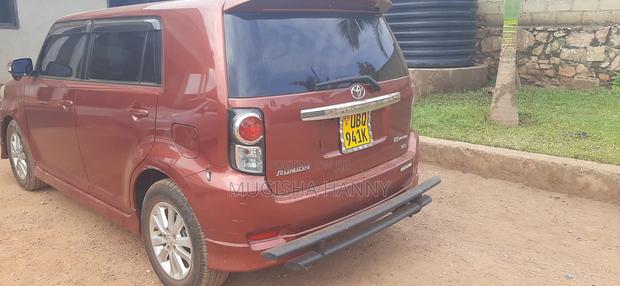 Toyota Corolla Rumion 2010 Maroon