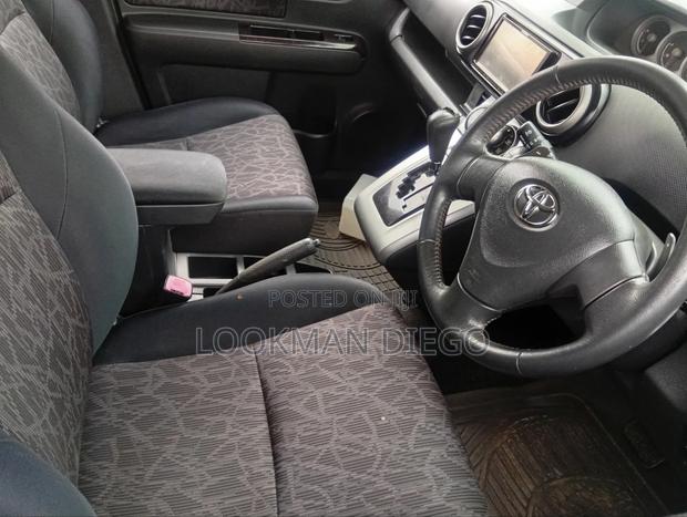 Toyota Corolla Rumion 2011 Maroon
