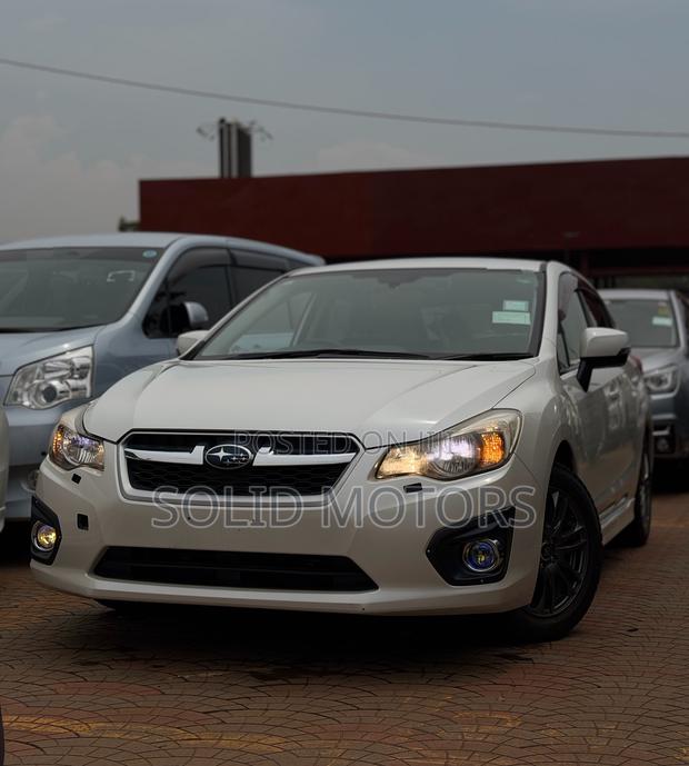 Subaru Impreza 2.0i Limited PZEV 4dr Hatchback AWD (2.0L 4cyl CVT) 2014