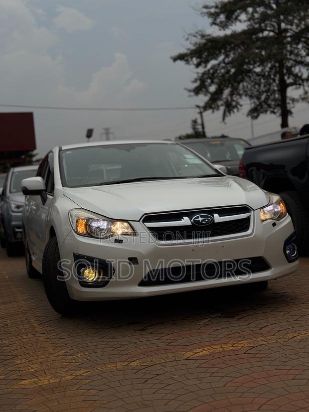 Subaru Impreza 2.0i Limited PZEV 4dr Hatchback AWD (2.0L 4cyl CVT) 2014