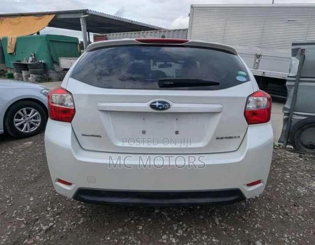 Subaru Impreza 2.0i Limited PZEV 4dr Hatchback AWD (2.0L 4cyl CVT) 2015