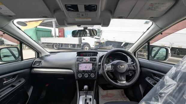 Subaru Impreza 2.0i Limited PZEV 4dr Hatchback AWD (2.0L 4cyl CVT) 2015