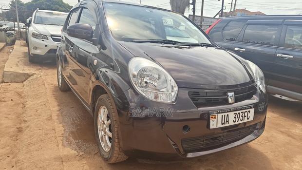 Toyota Passo 2011 Maroon