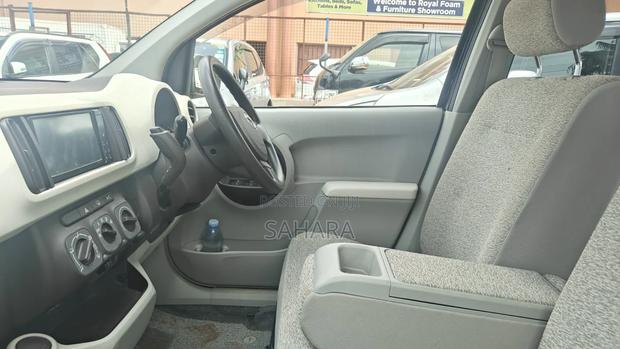 Toyota Passo 2011 Maroon