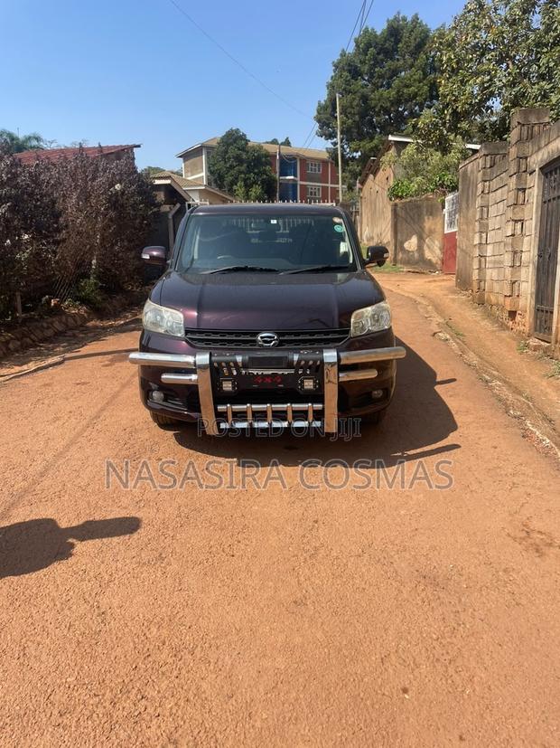 Toyota Rumion 1.5 FWD 2023 Burgundy