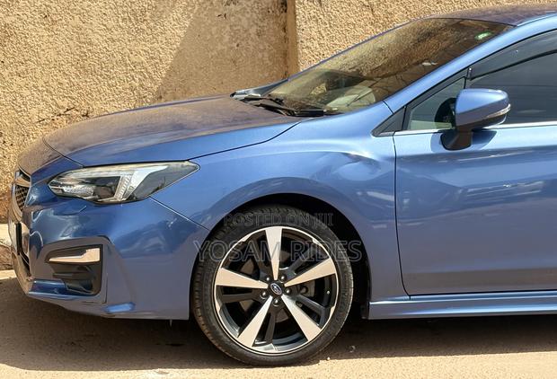 Subaru Impreza 2.0i Limited PZEV 4dr Hatchback AWD (2.0L 4cyl CVT) 2015