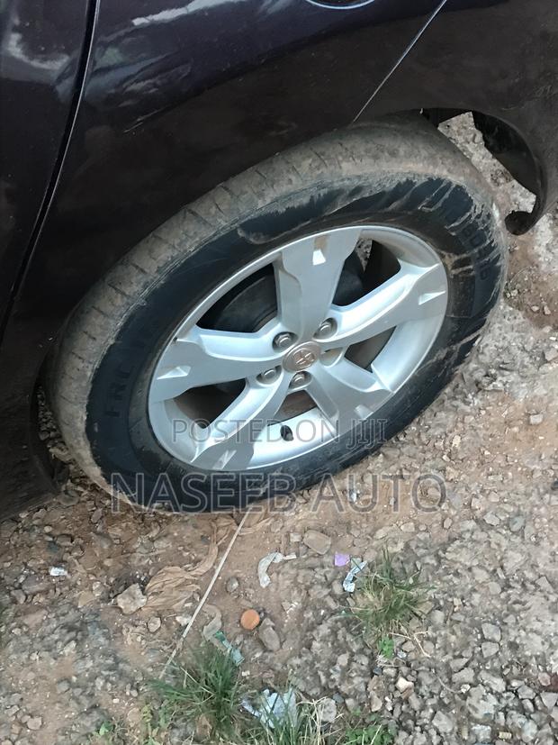 Toyota IST 2009 Maroon
