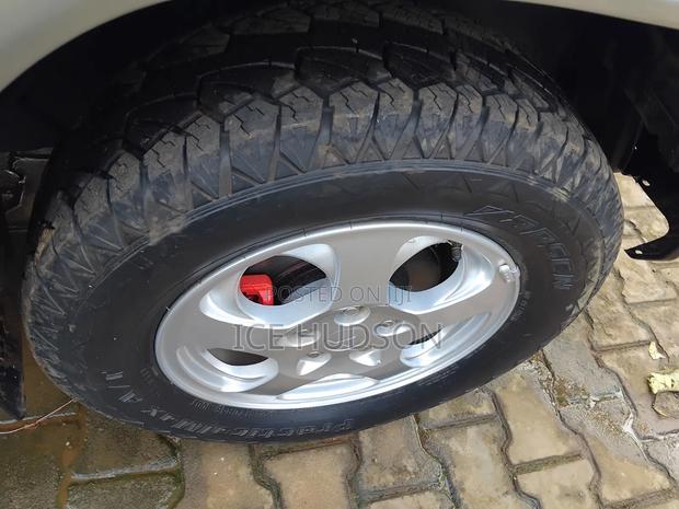 Mitsubishi Pajero IO 2003 Maroon